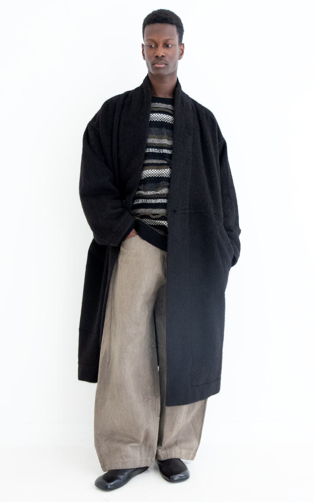 Coat with standing collar