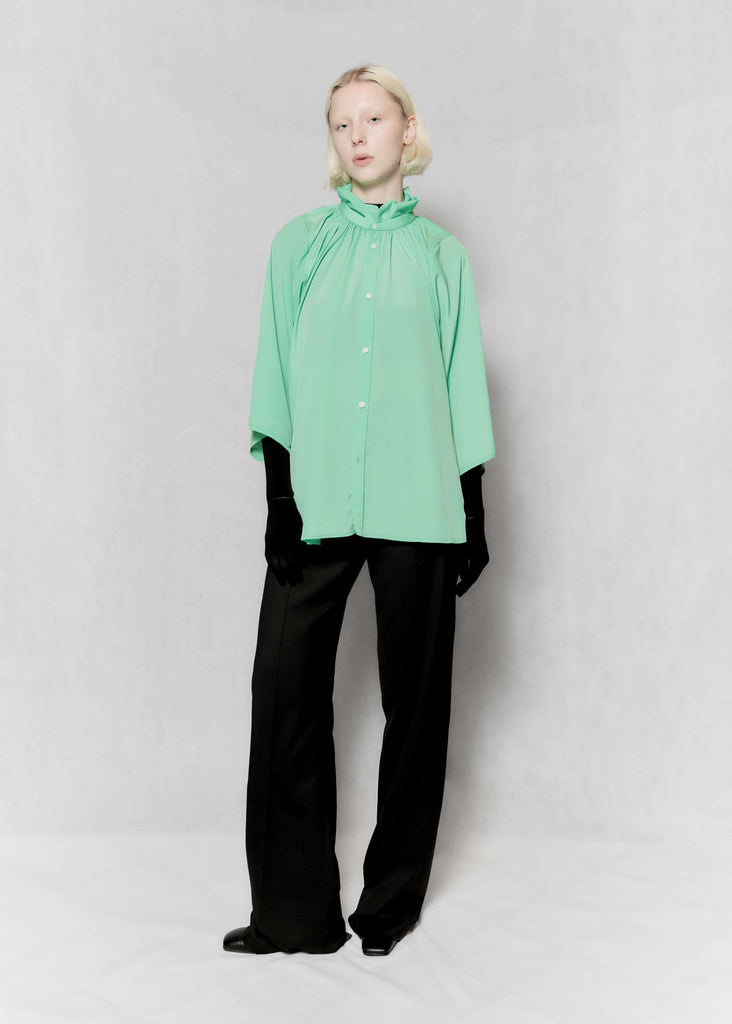 Ruffled collar blouse