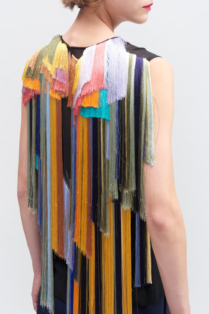 Sleeveless top with fringes